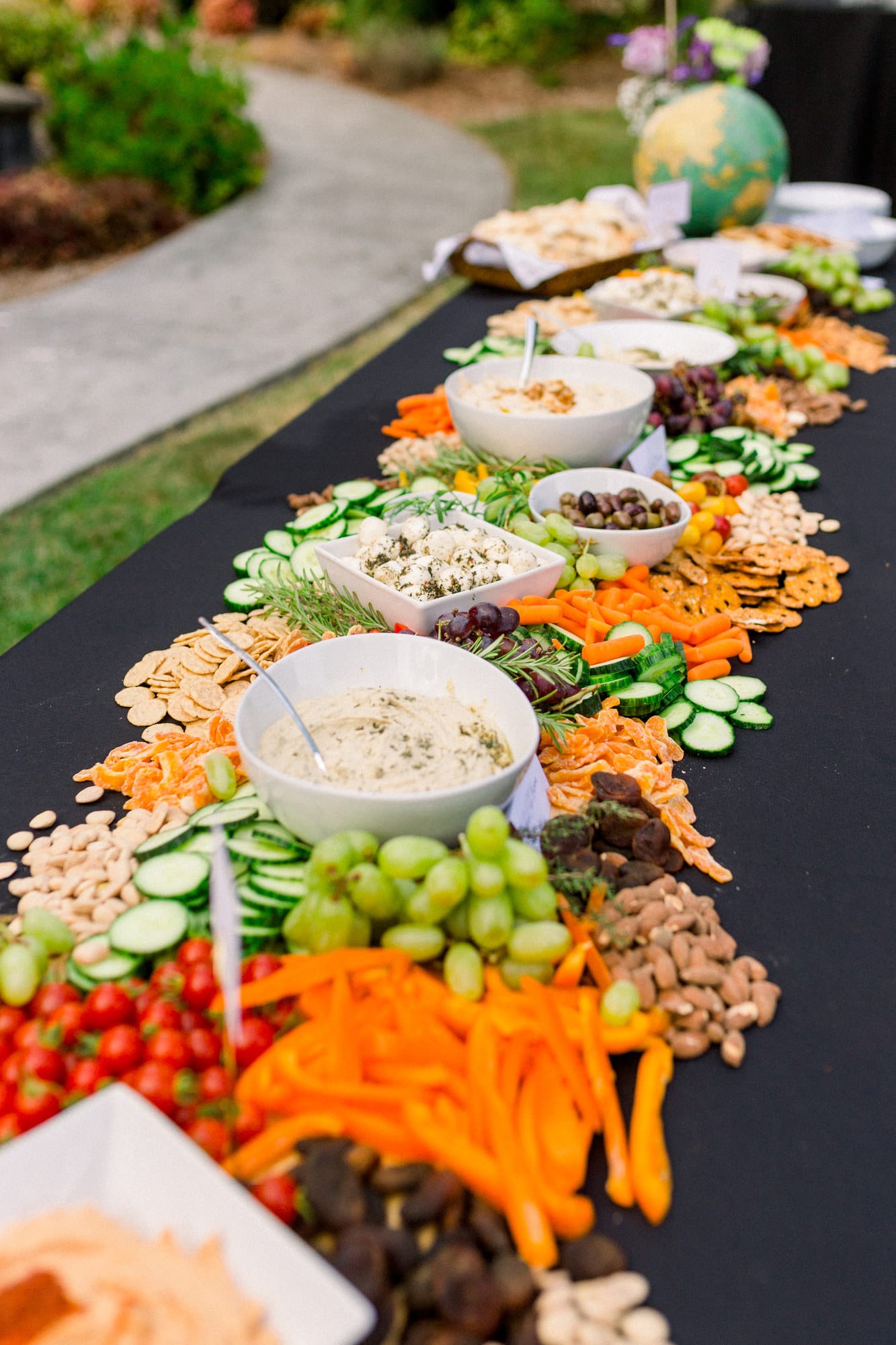 a wedding grazing table with hummus