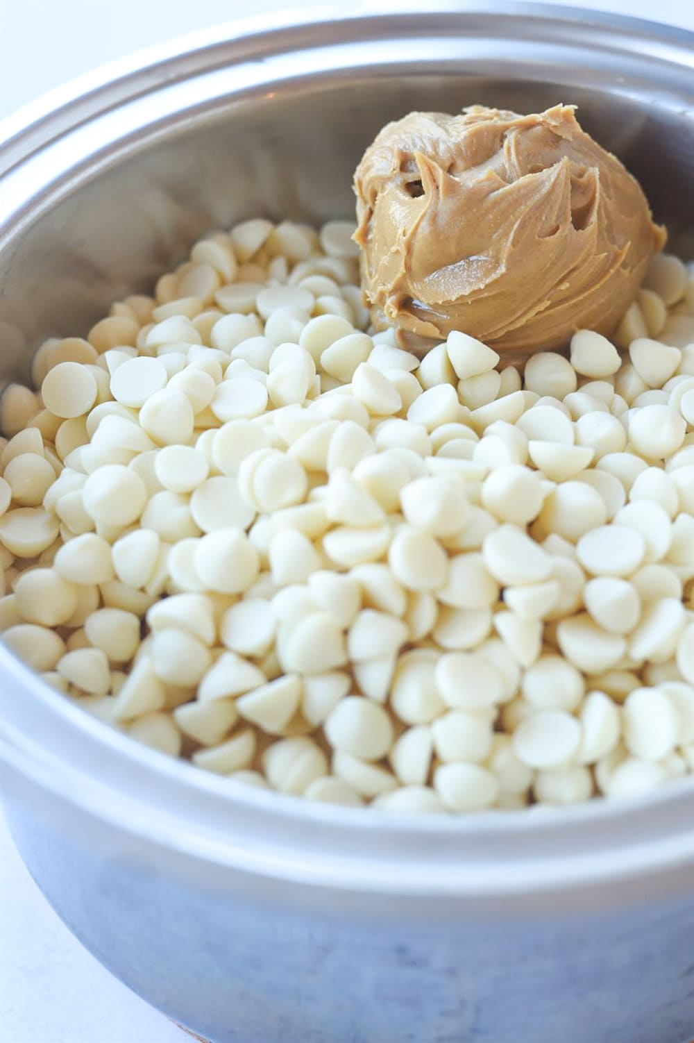 white chocolate chips and peanut butter in a double boiler