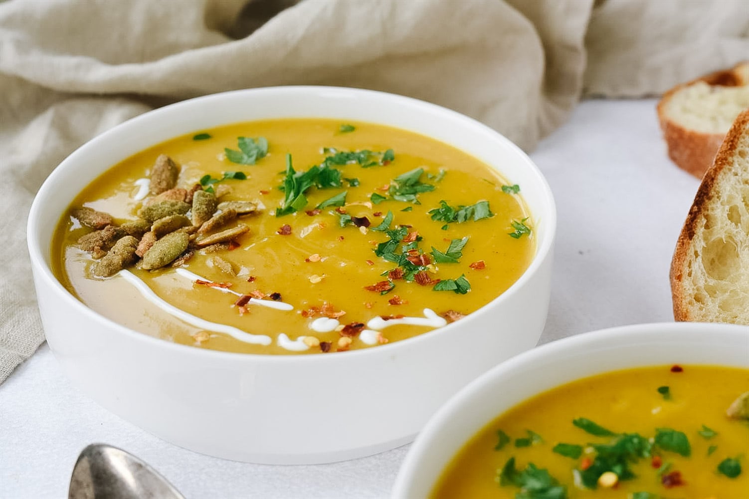 bowl of soup with pumpkin seeds