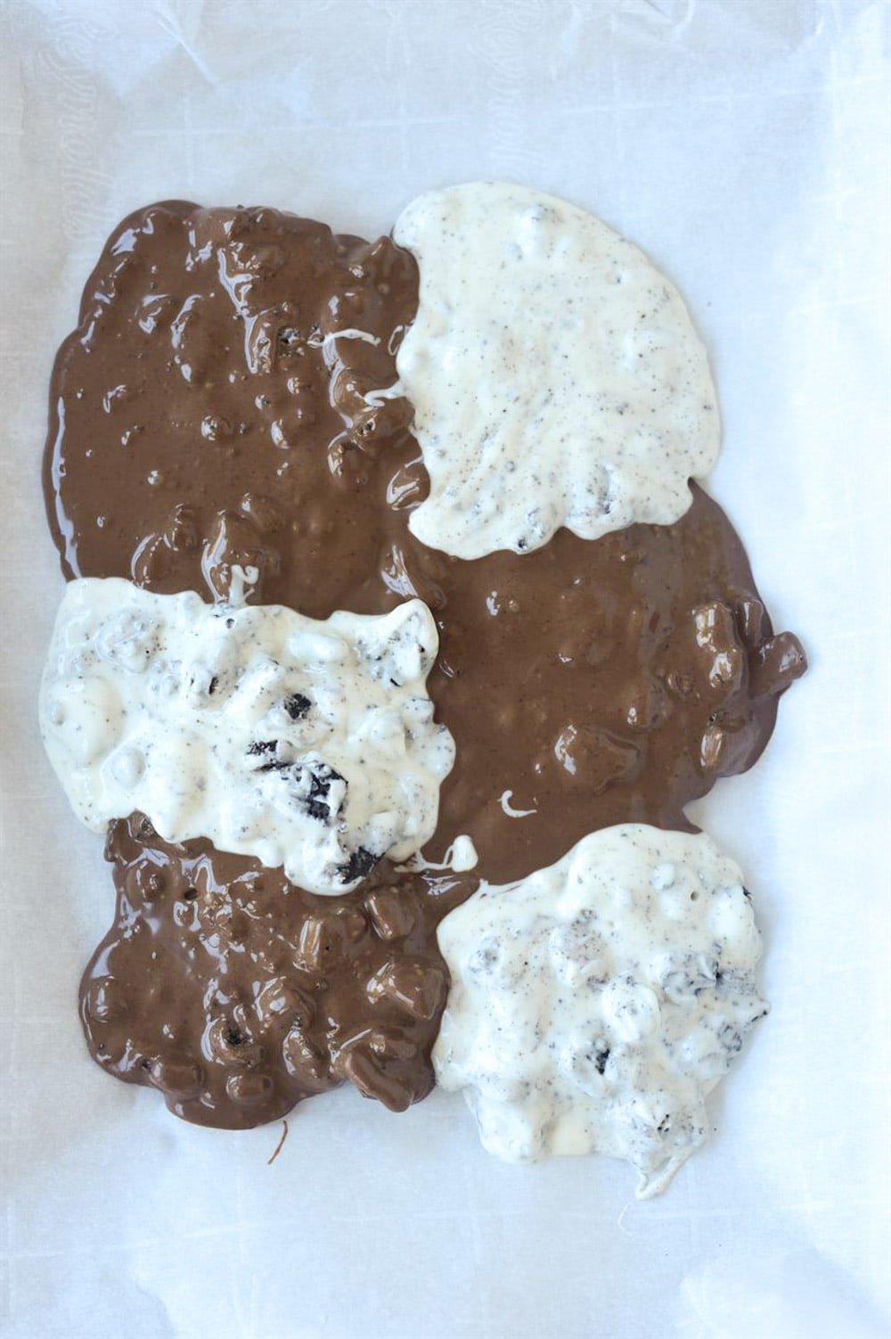 white chocolate and milk chocolate on a baking sheet