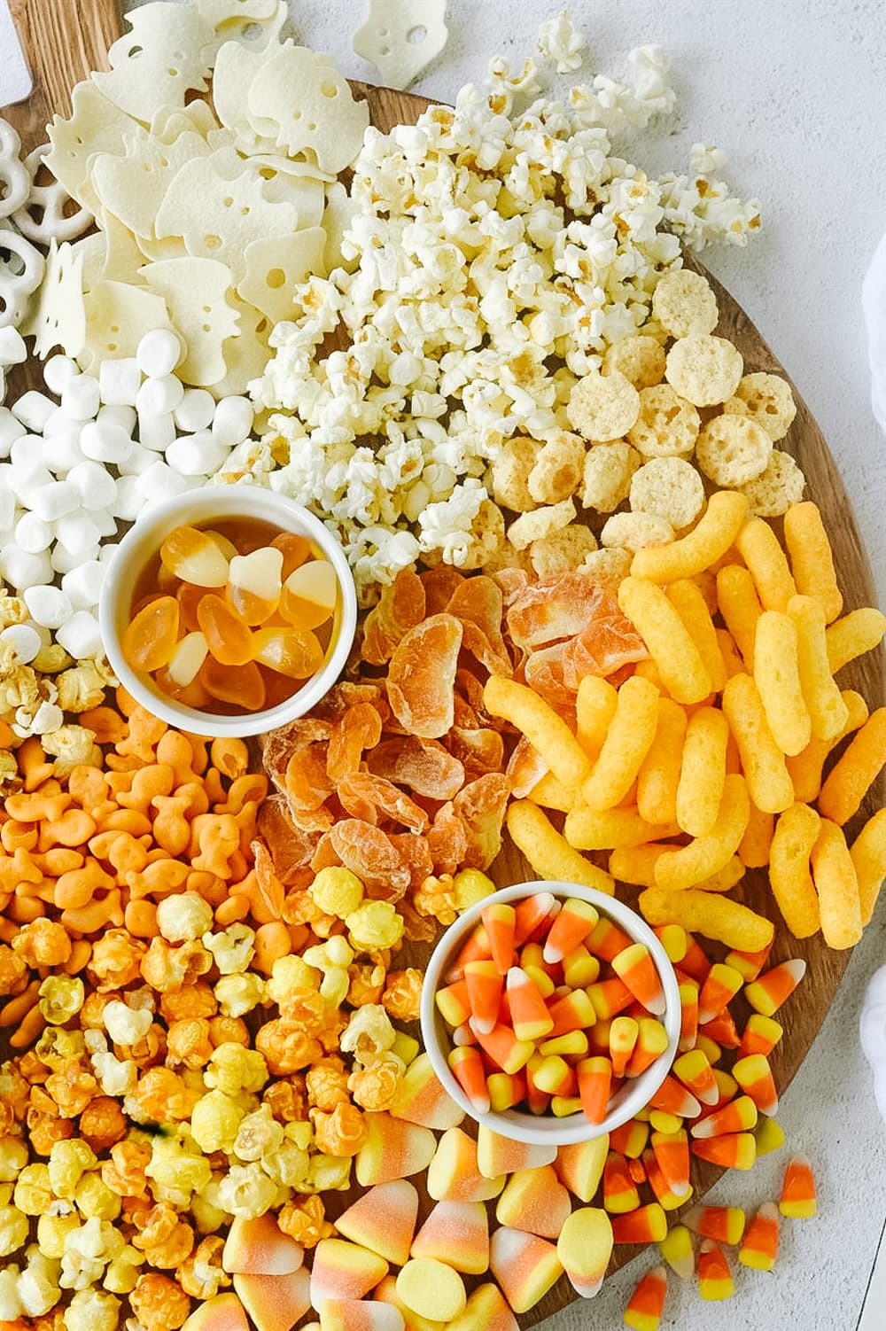 candy corn snack board with popcorn