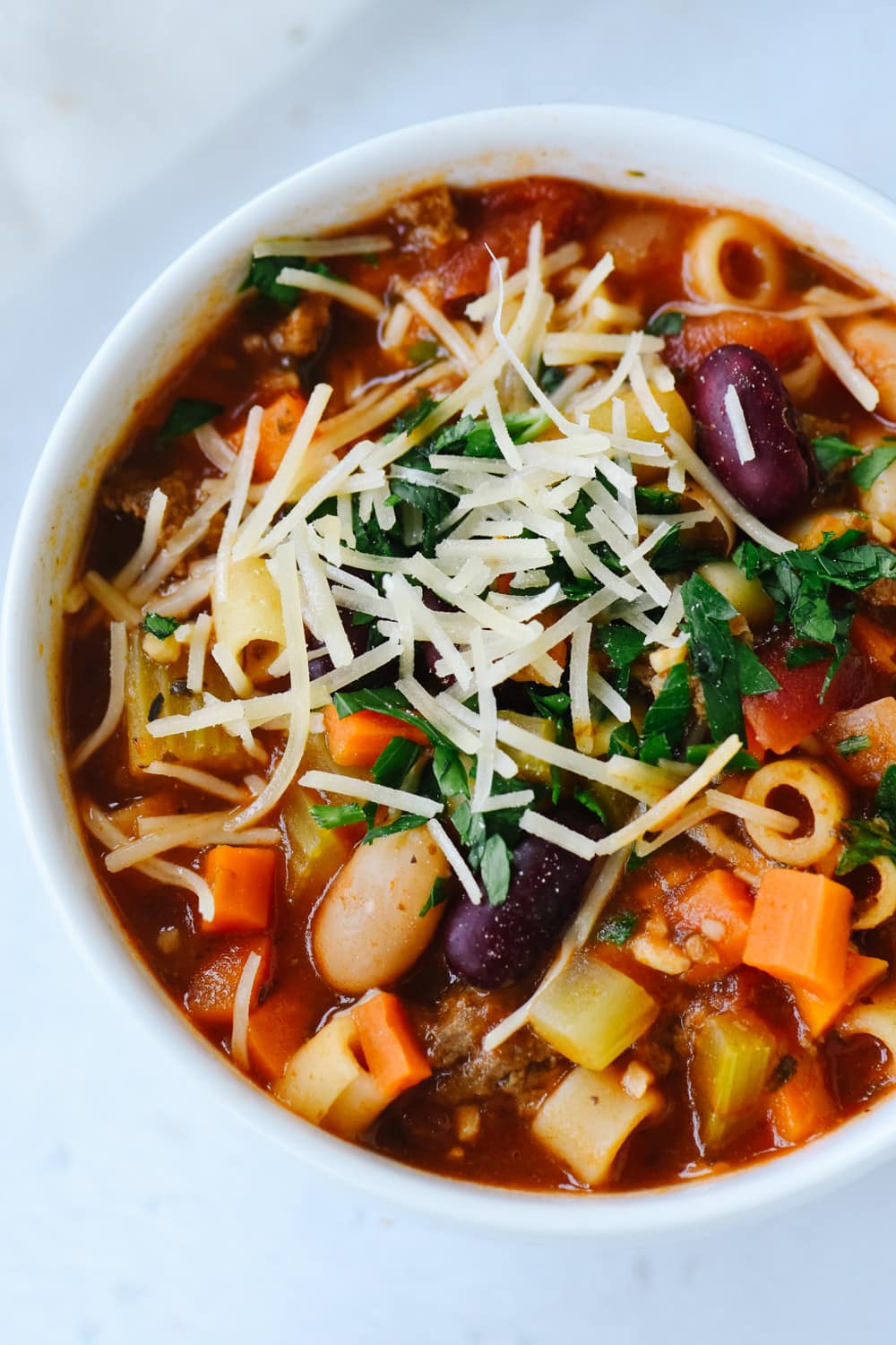 Close up of a bowl of pasta fagioli soup