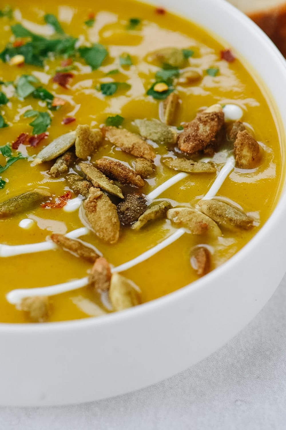 close up of bowl of butternut squash soup