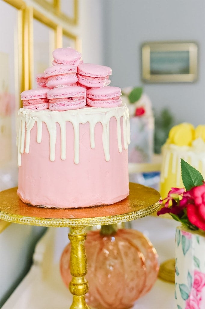 pink cake with macarons