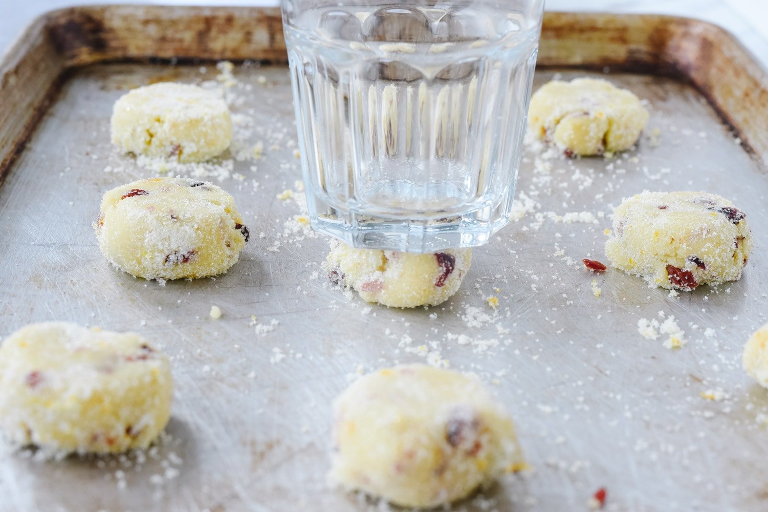 Orange Cranberry COokies being flattened