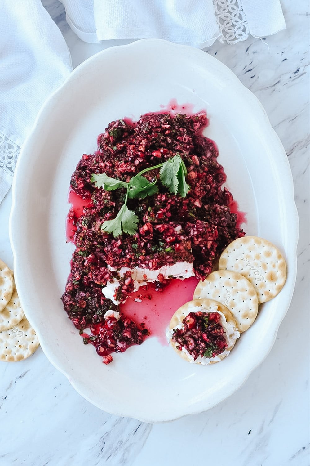 overhead shot of cranberry salsa on cream cheese