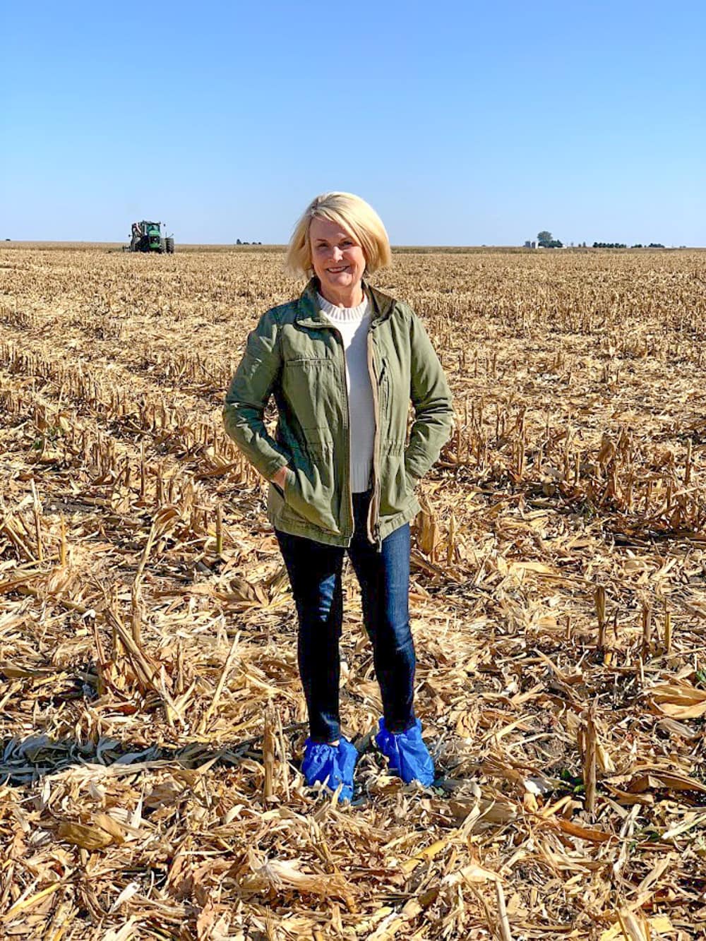 standing in a field of corn