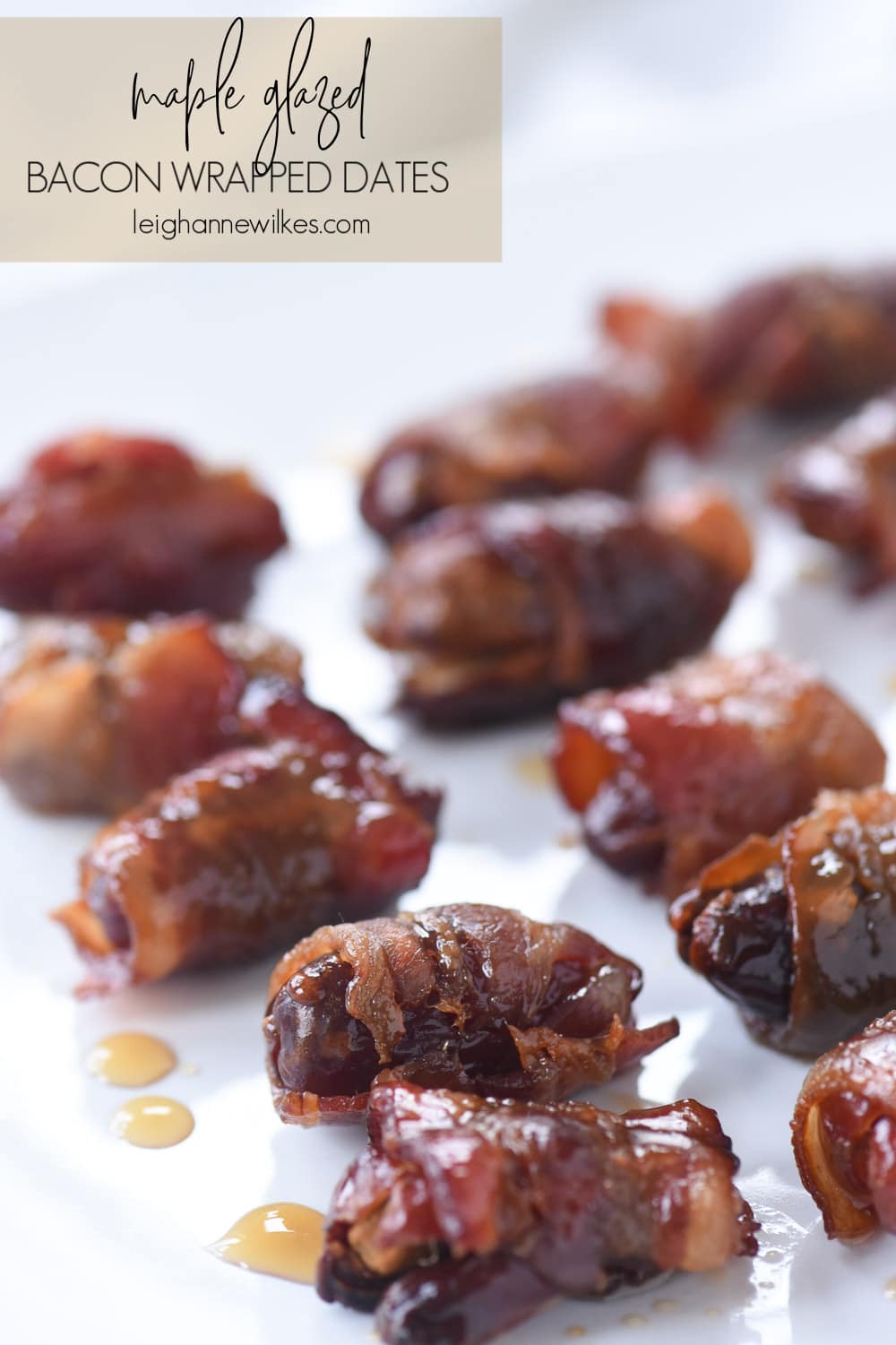 bacon wrapped dates on a plate 