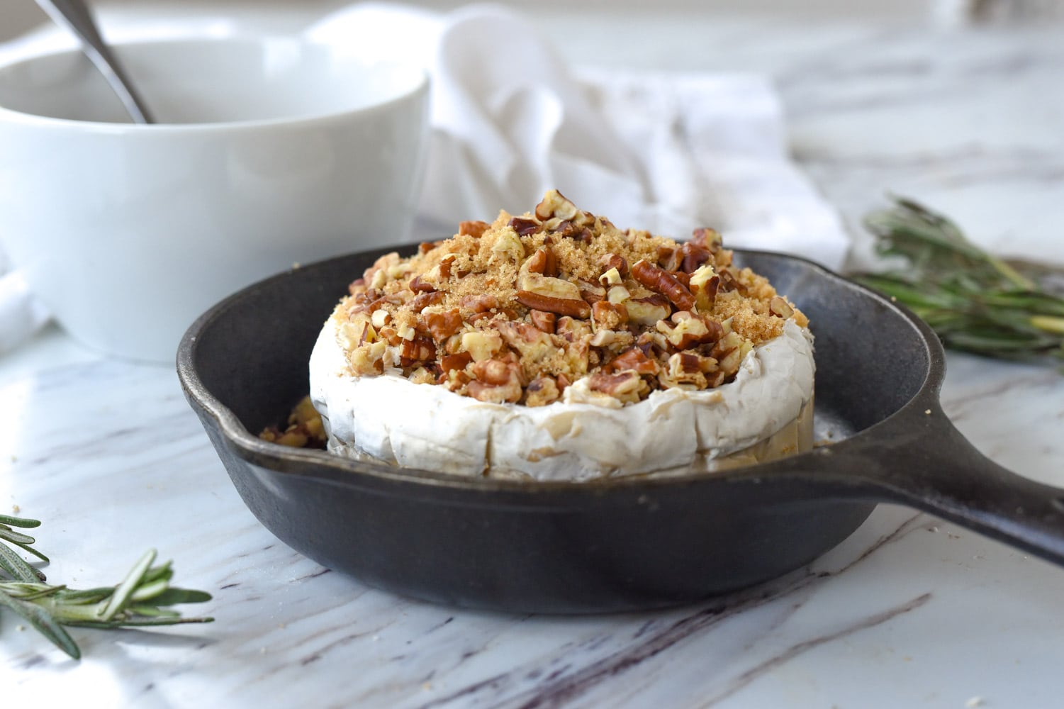 brie with brown sugar and pecans on top