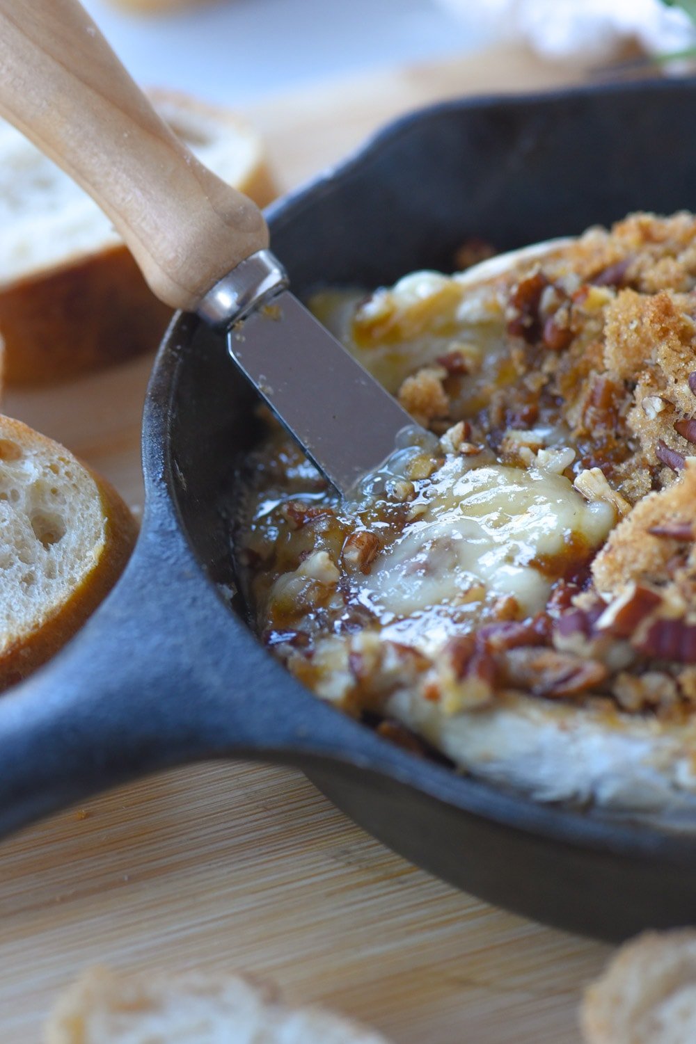 melted brie in a pan