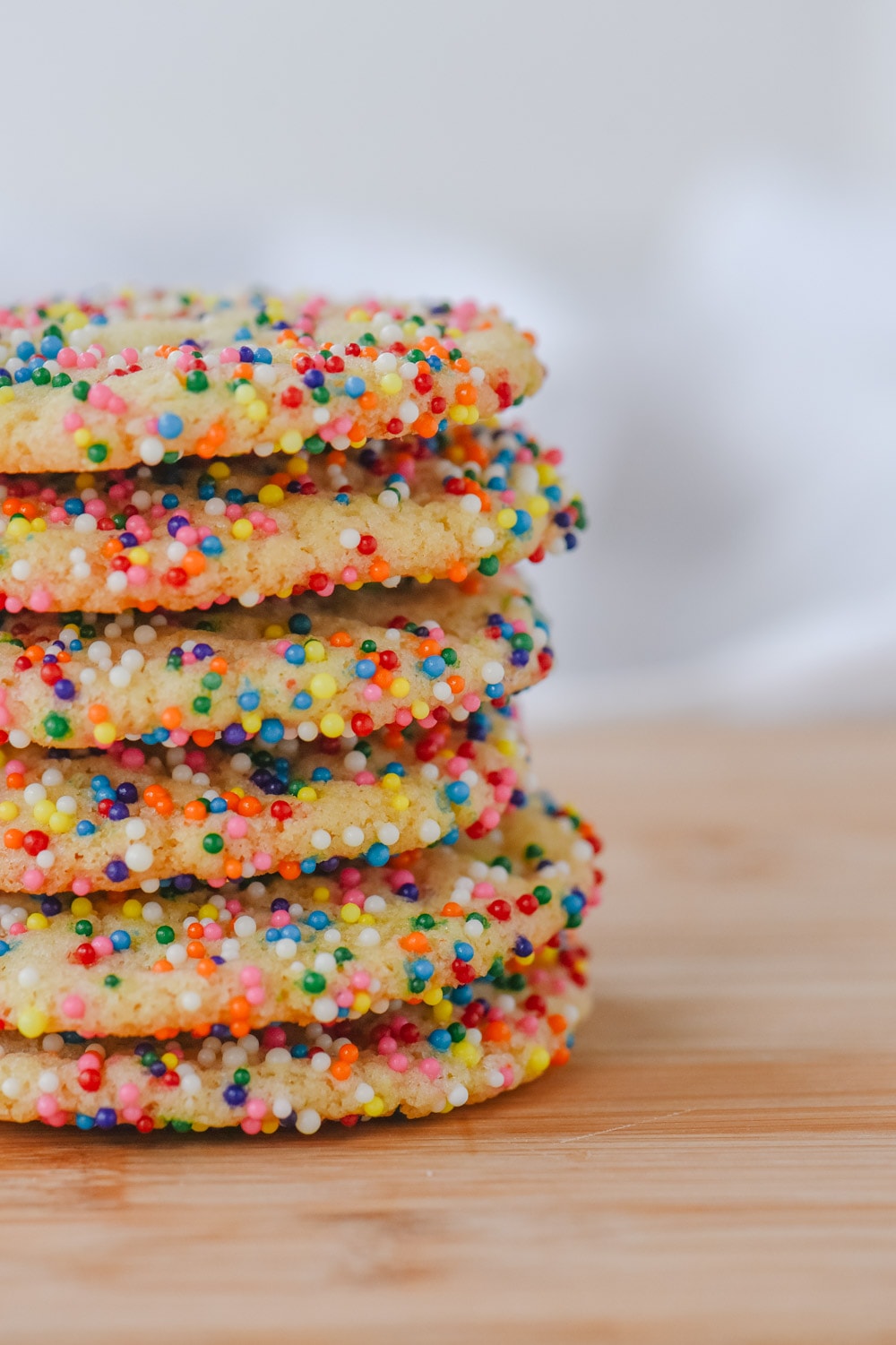 stack of sugar cookies with sprinkles