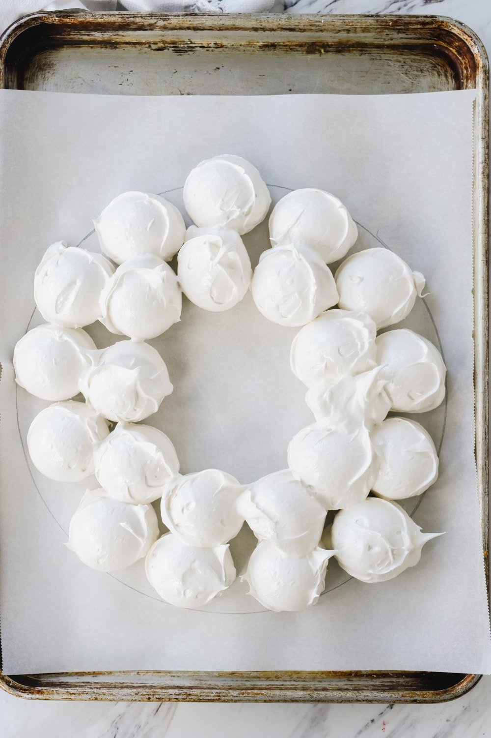 Scoops of meringue forming a wreath