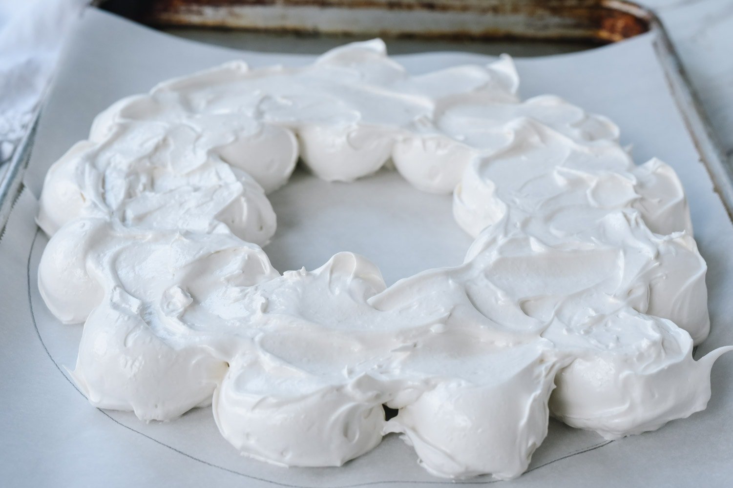 pavlova wreath on a baking sheet