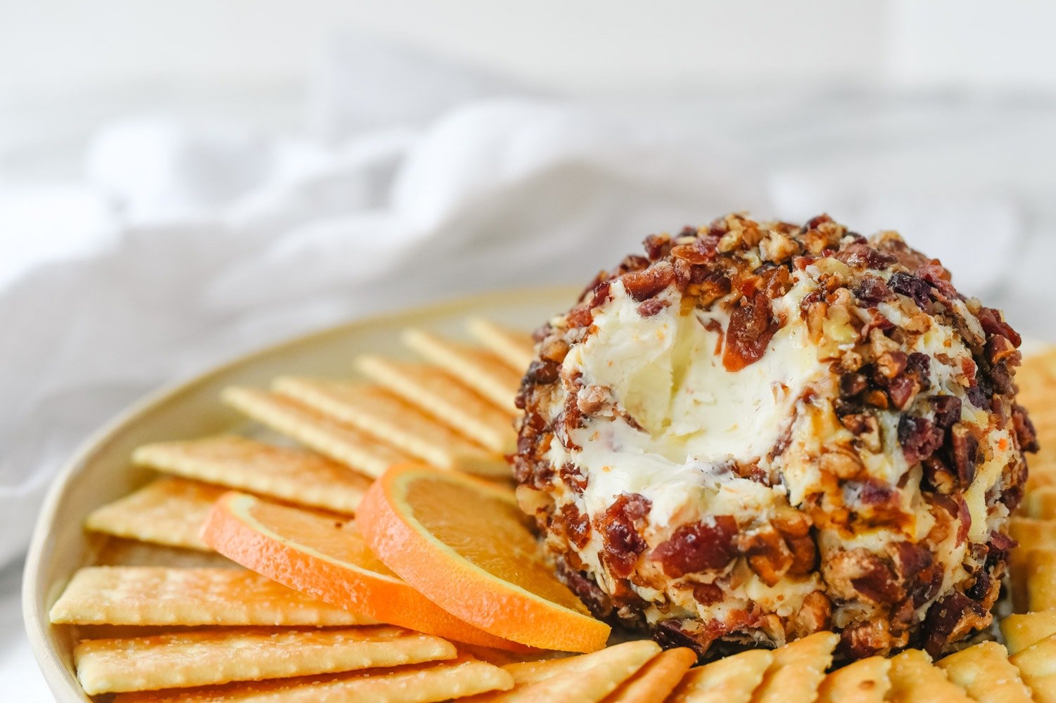 bite out of a orange cranberry cheese ball