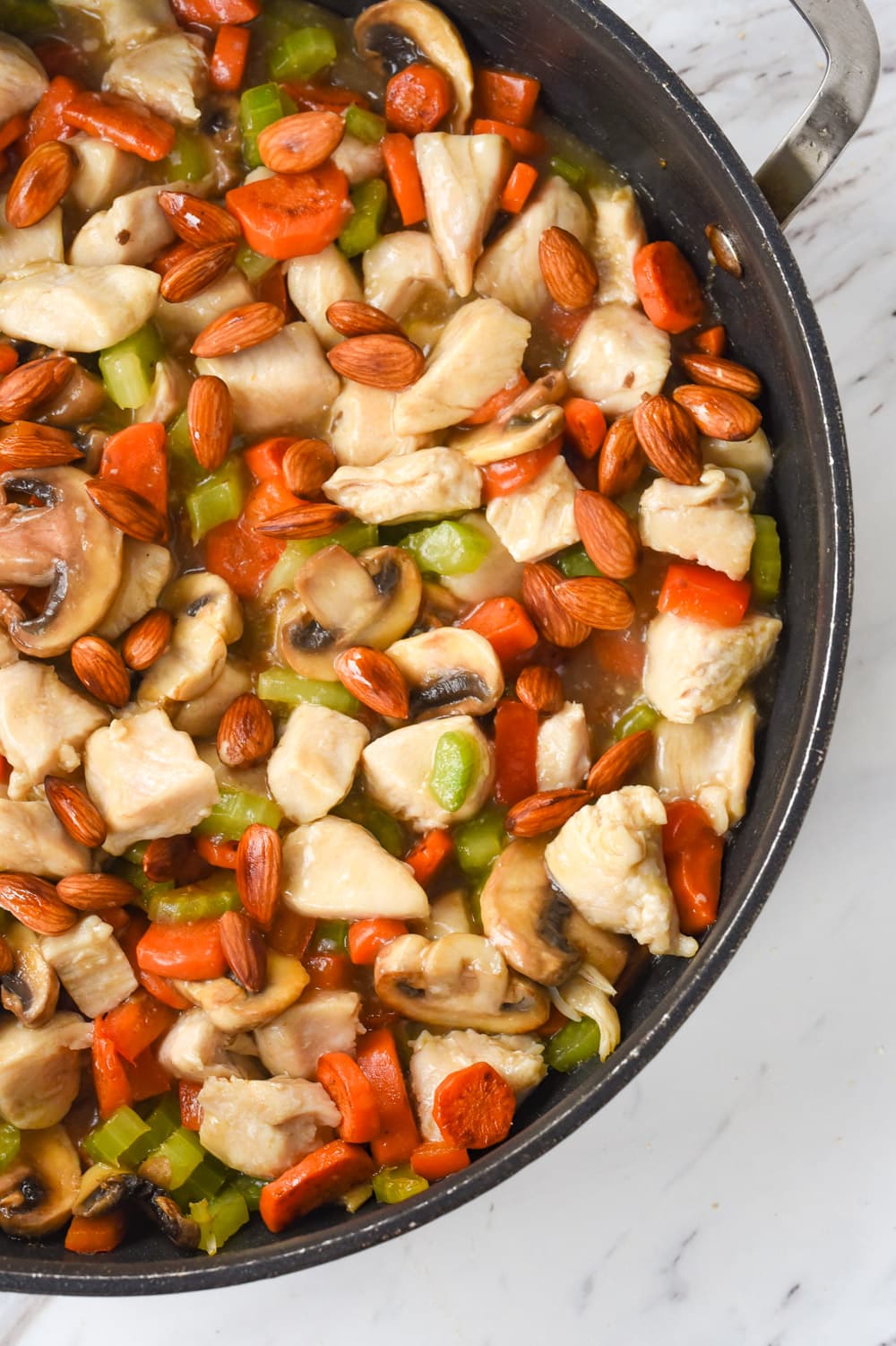 frying pan full of almond chicken