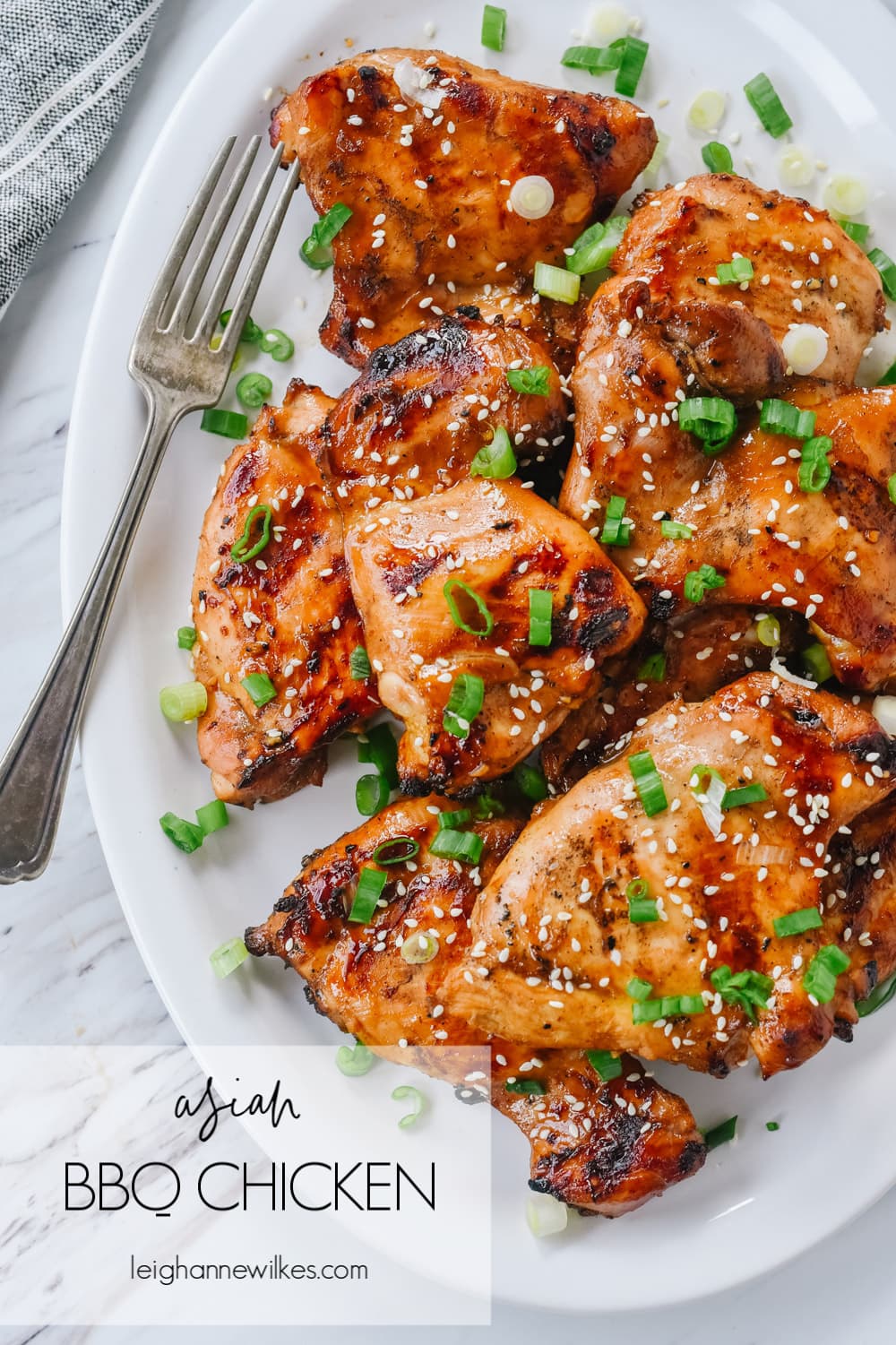 asian bbq chicken on a plate with a fork