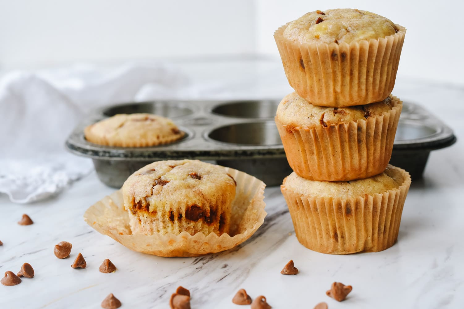 stack of banana cinnamon chip muffins