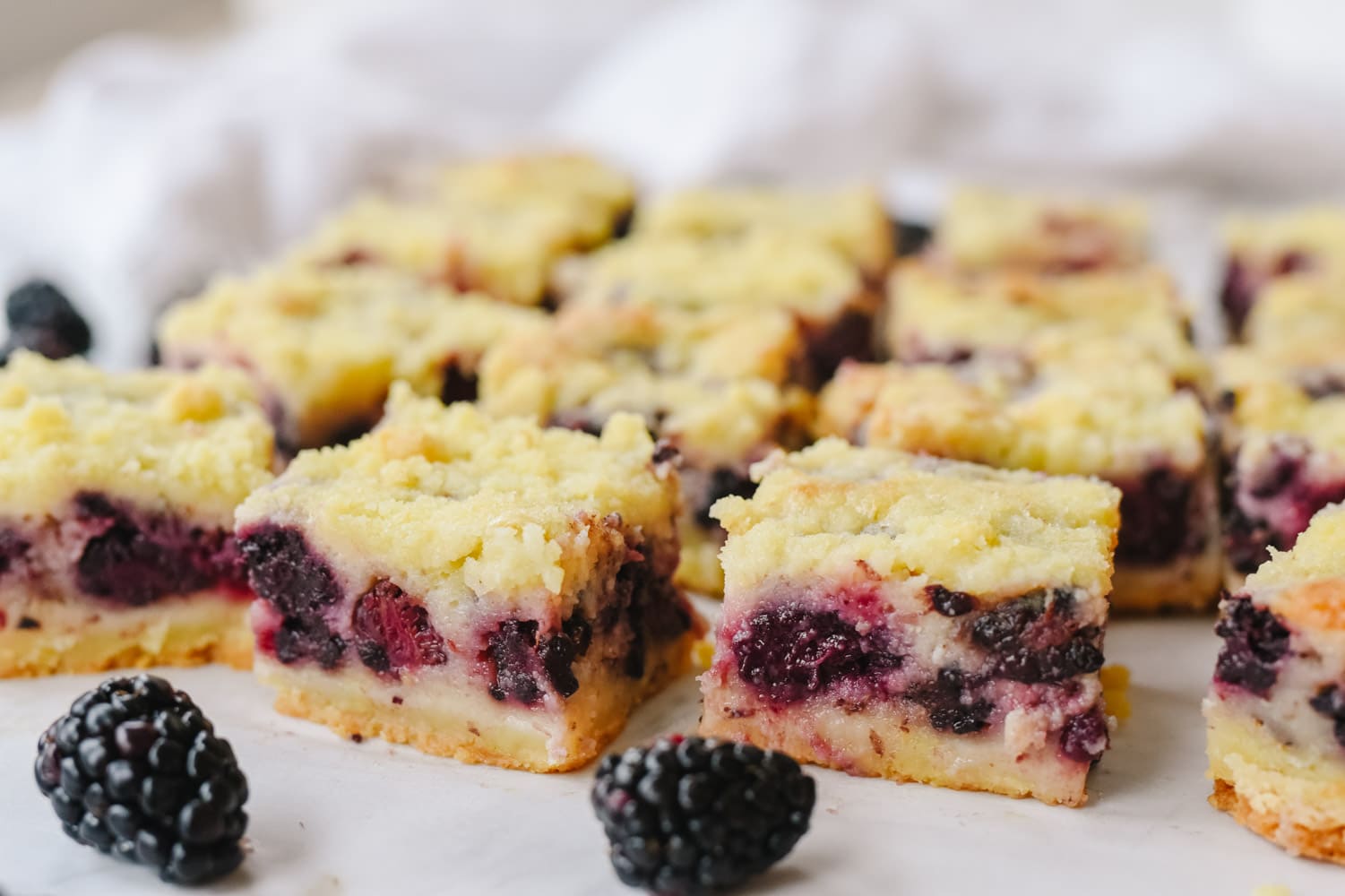 blackberry pie bars cut into squares