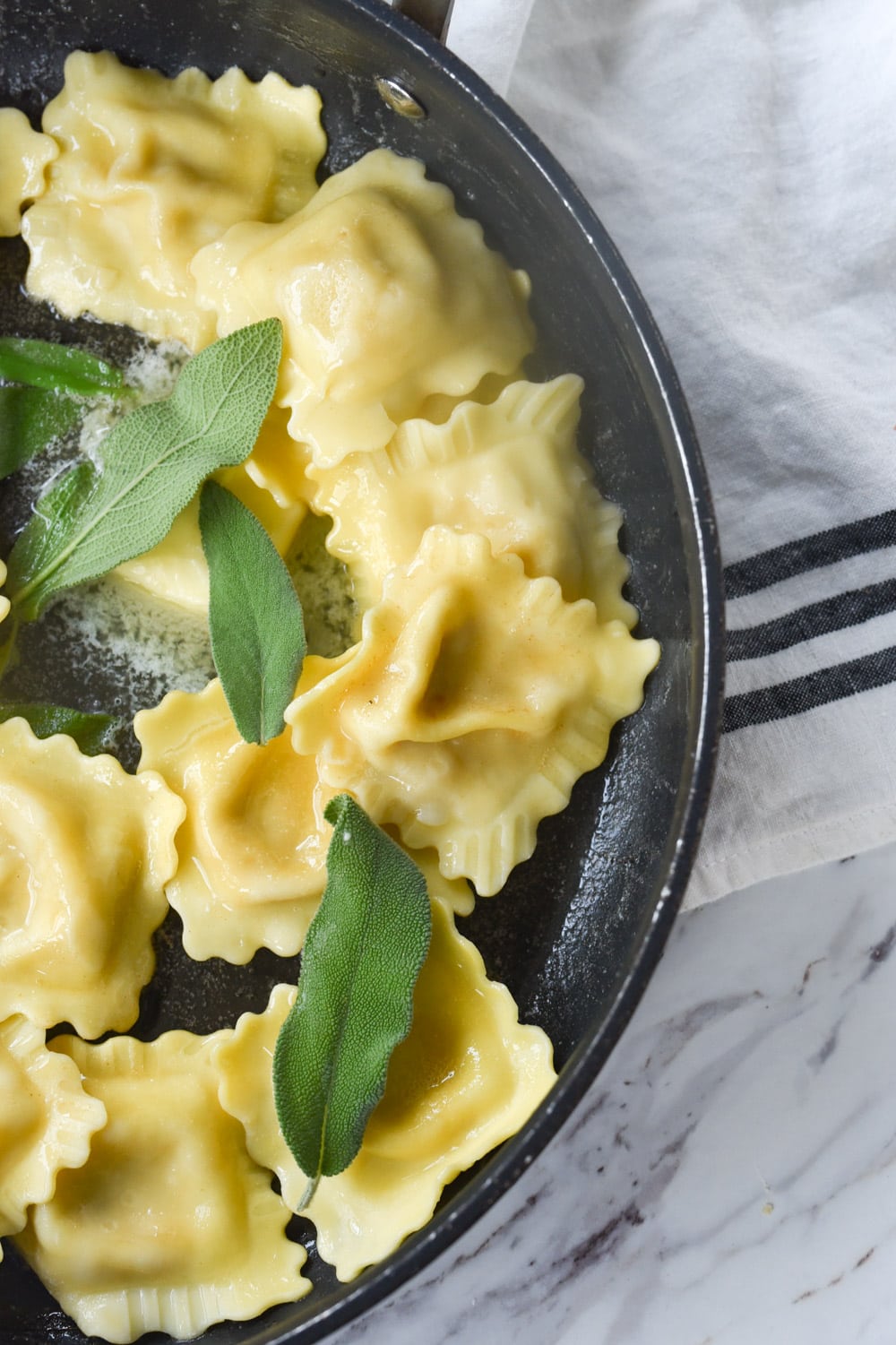 brown buttter ravioli in pan