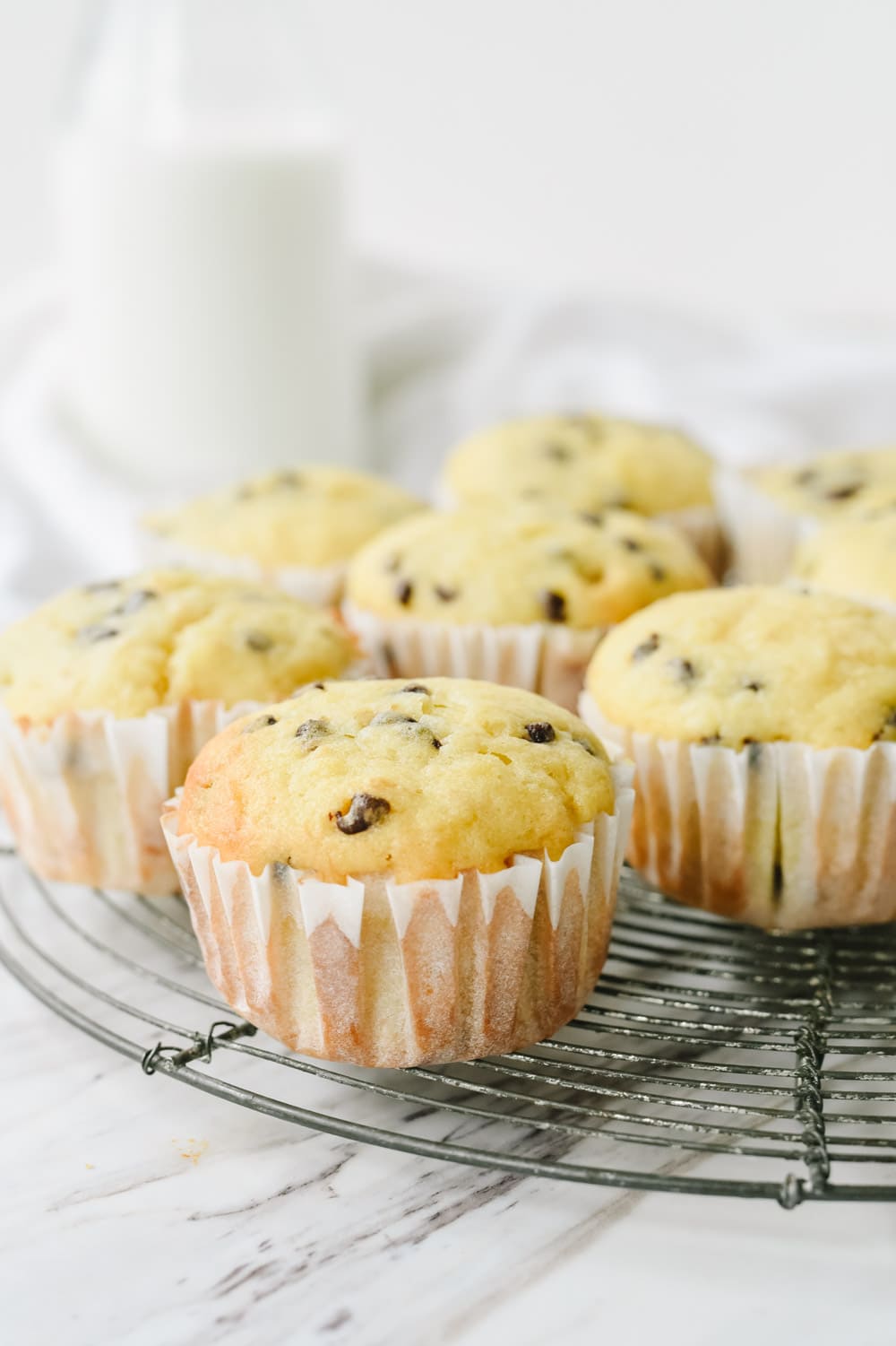 banana chocolate chip muffins on a rack