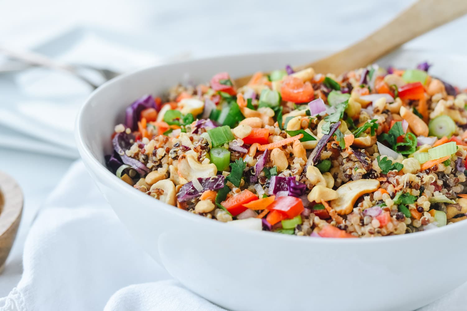 white bowl of thai quinoa salad