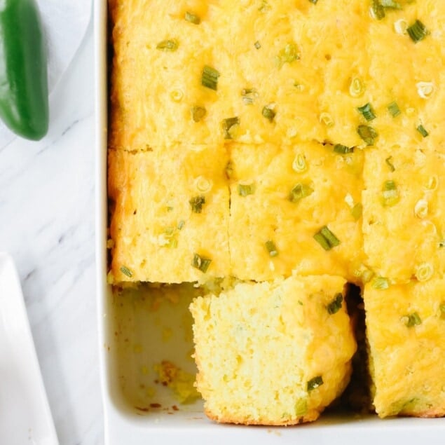 slice of jalapeno cornbread in a pan