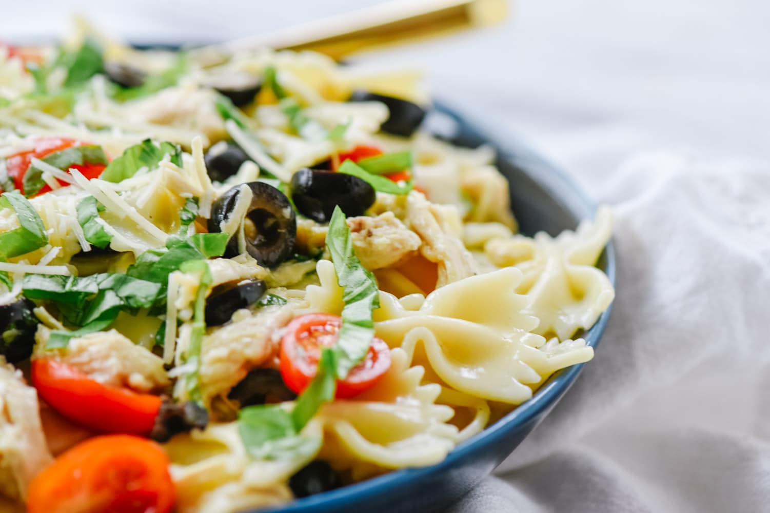 mediterranean pasta in a bowl with a fork