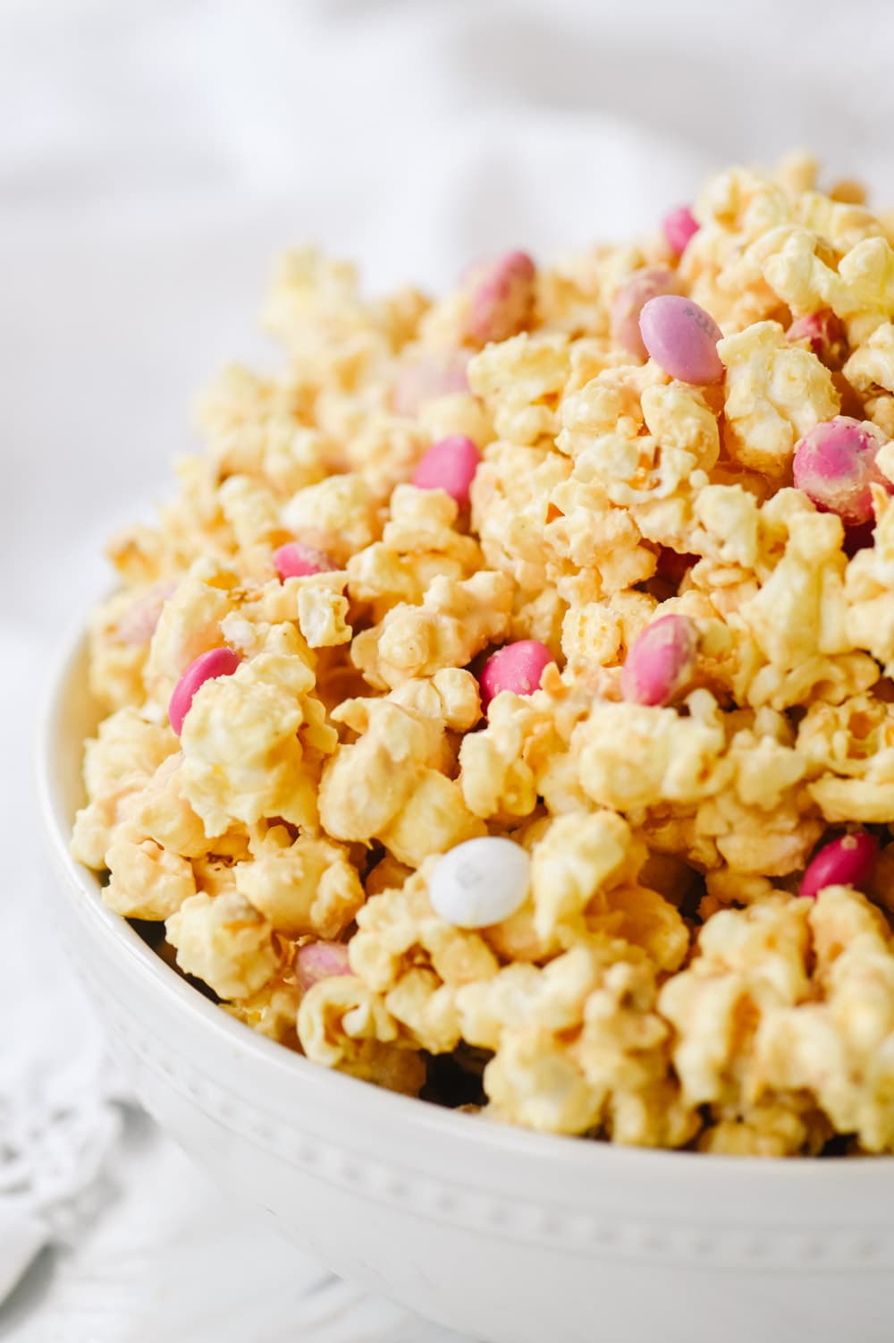 peanut butter popcorn in a white bowl