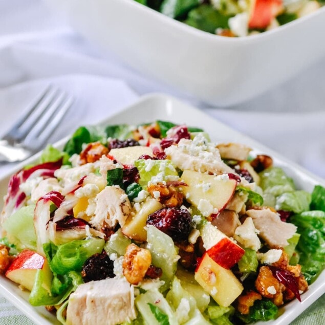 Winter Salad with apples and walnuts on a plate