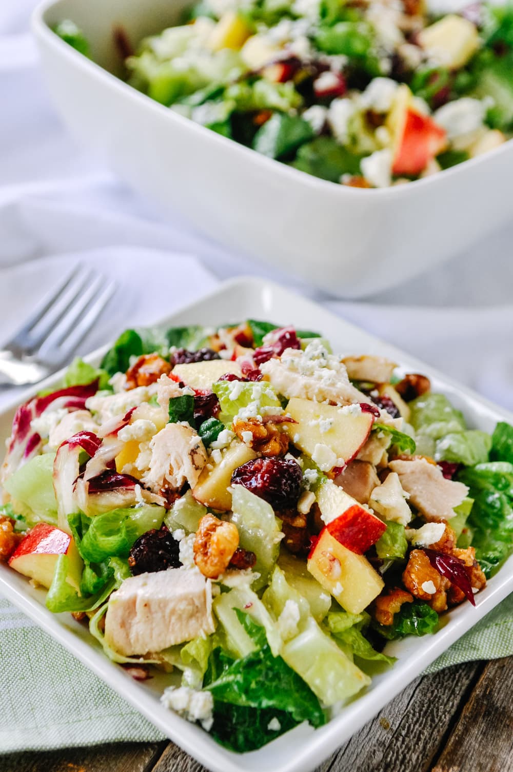 Winter Salad with apples and walnuts on a plate