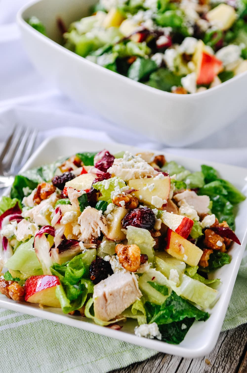 Chopped salad with apples and cranberries