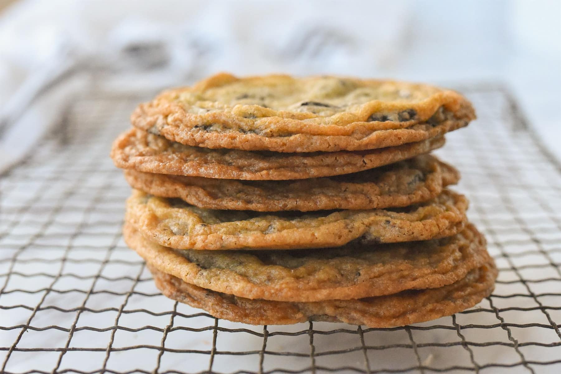 pile of crinkled chocolate chip cookies