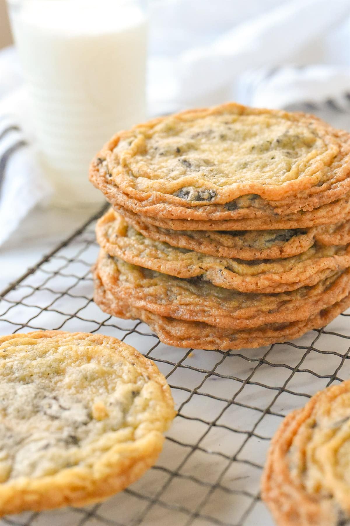 Giant Crinkled Chocolate Chip Cookies with a glass of milk