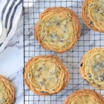 crinkled chocolate chip cookies on a cooling rack