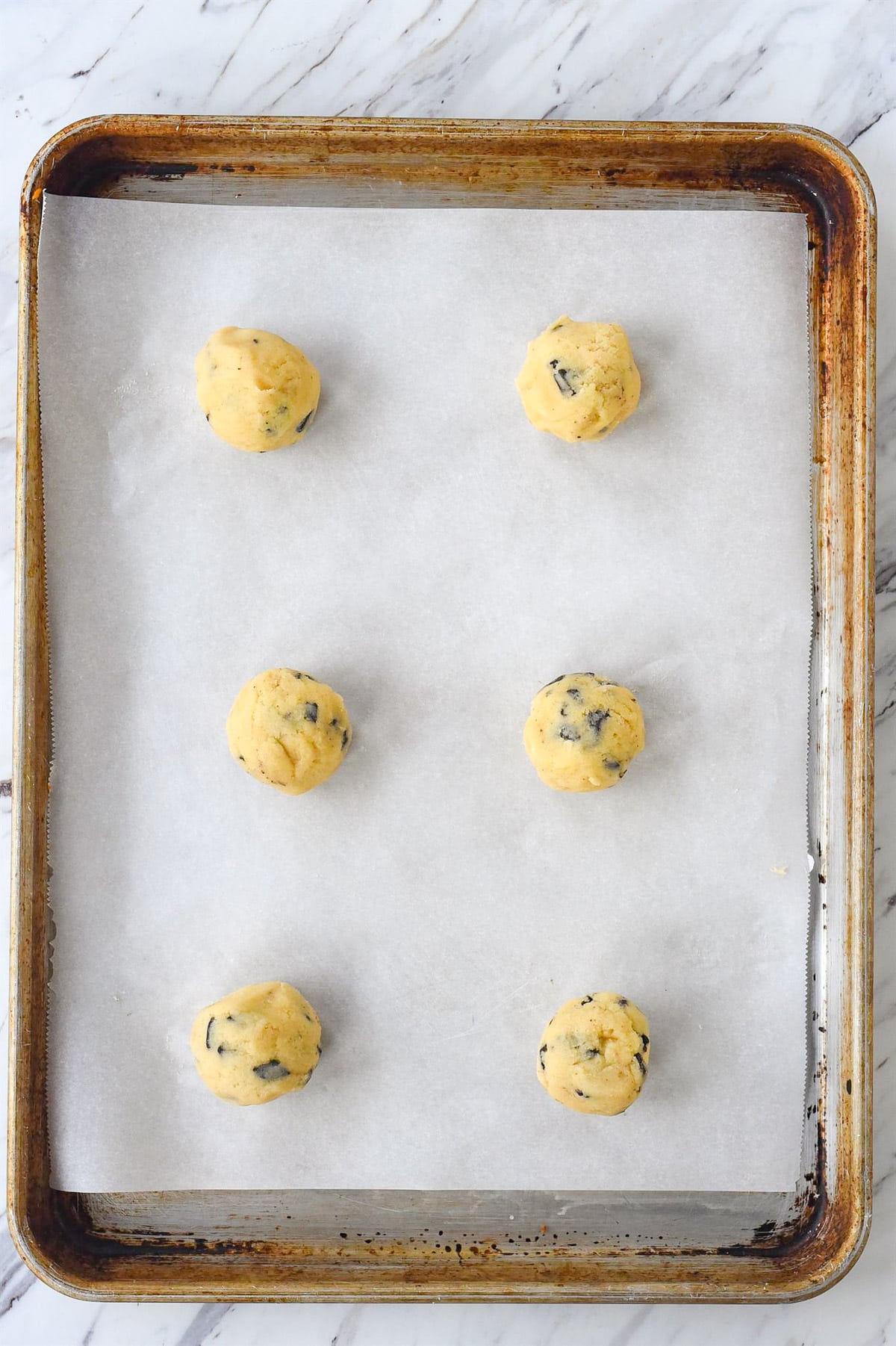 crinkle chocolate chip cookie dough on a baking sheet