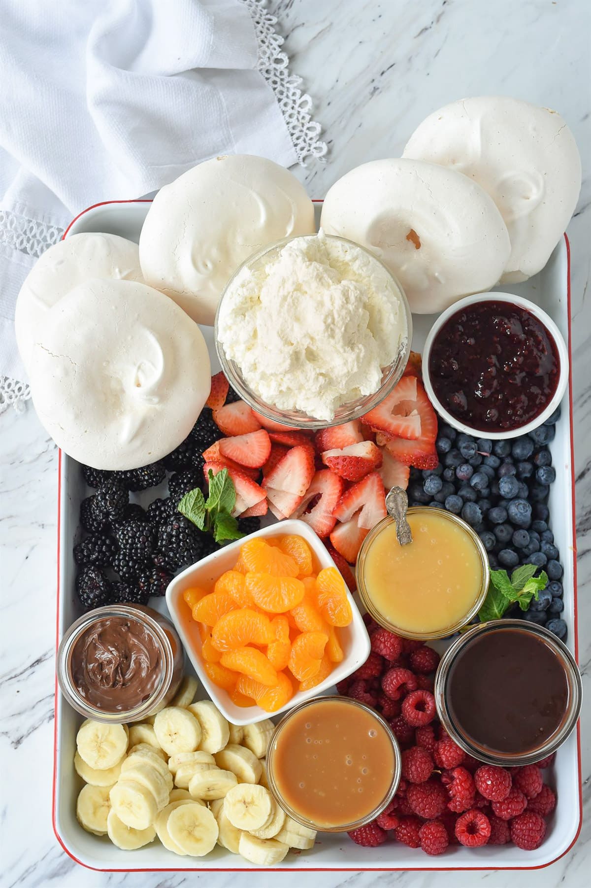 overhead shot of pavlova dessert board