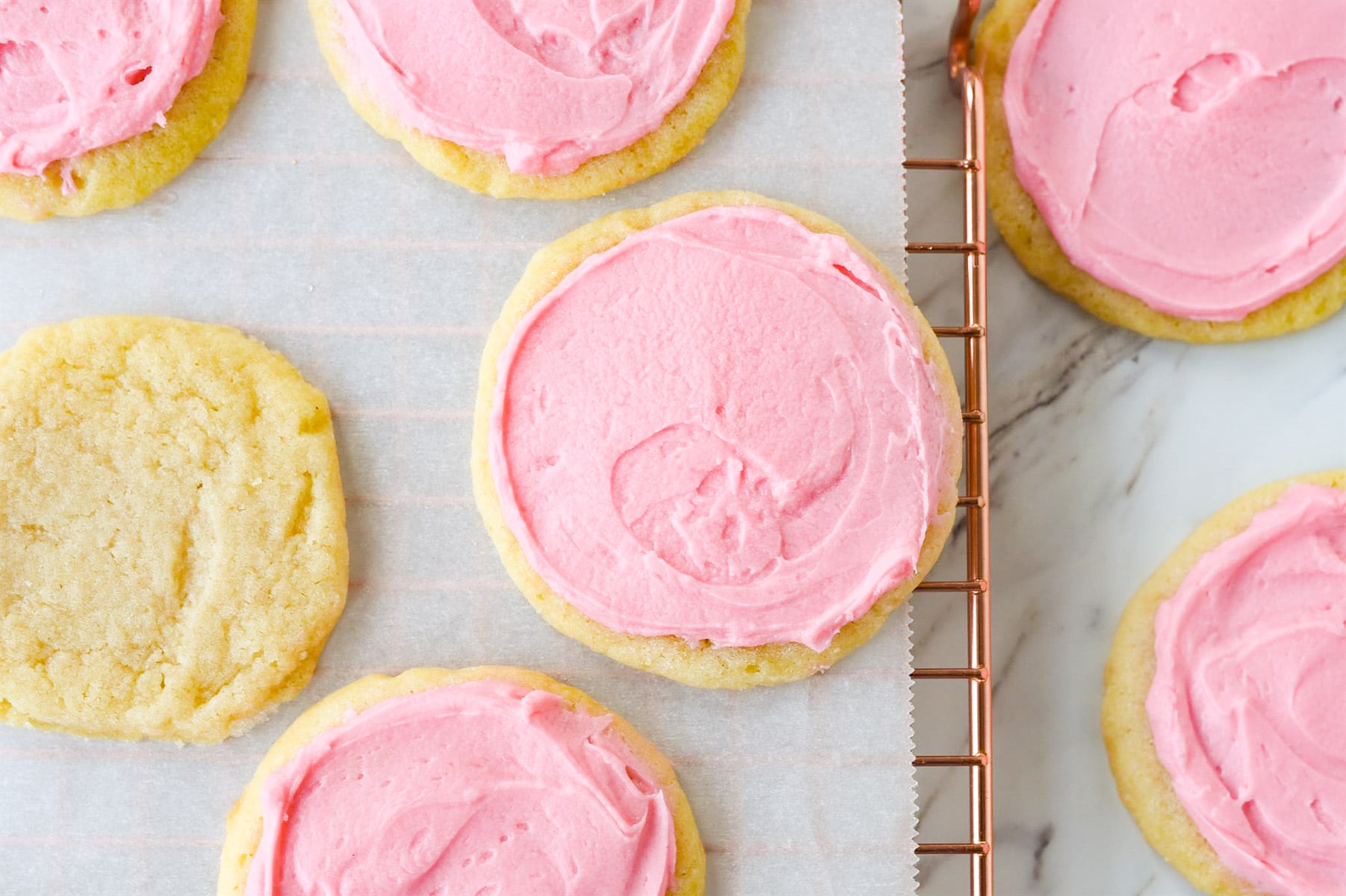 overhead shot of frosted sugar cookies