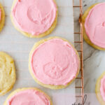 overhead shot of pink frosted sugar cookies