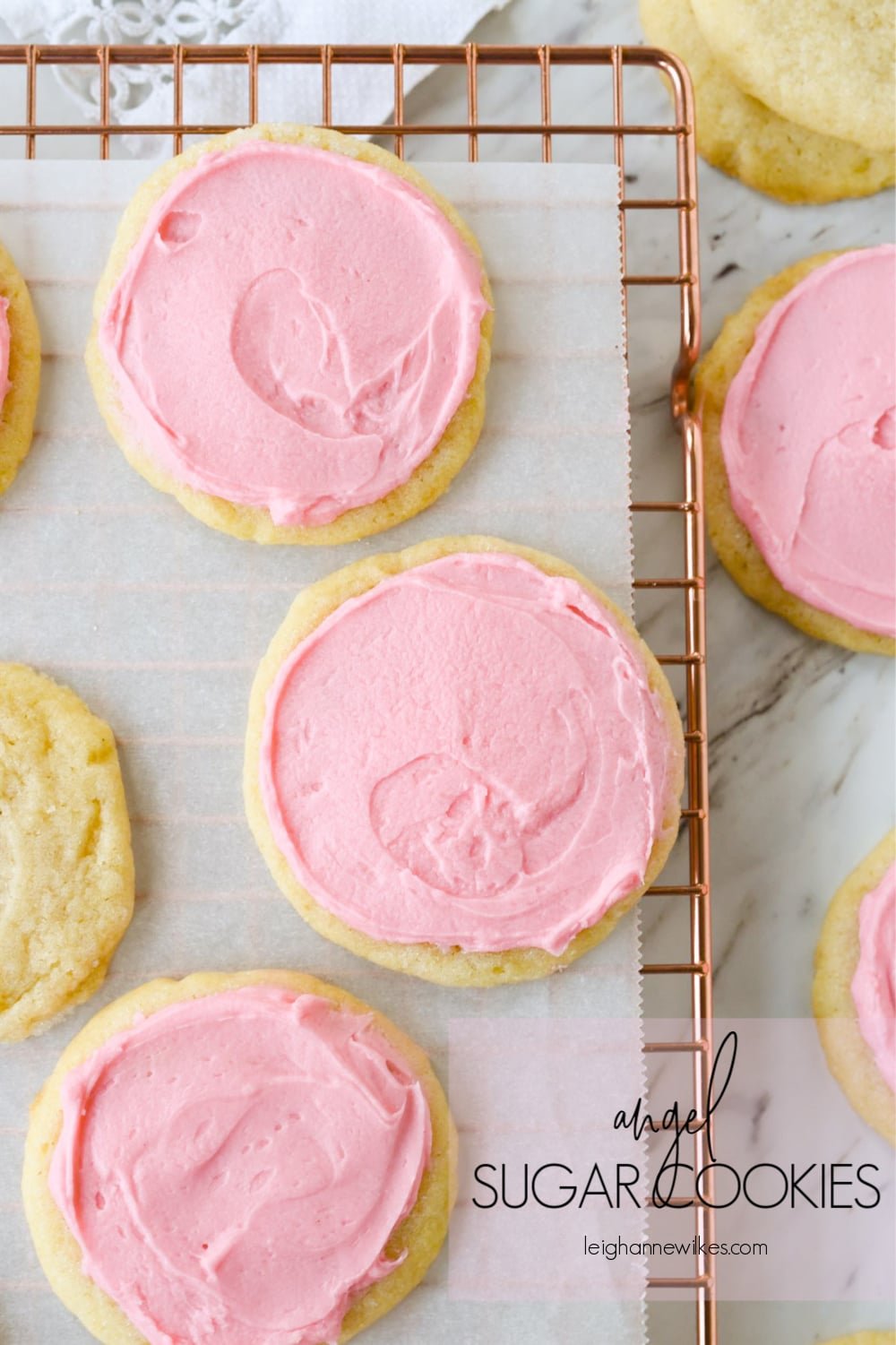 overhead shot of pink frosted sugar cookies