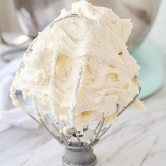 buttercream frosting on a whisk