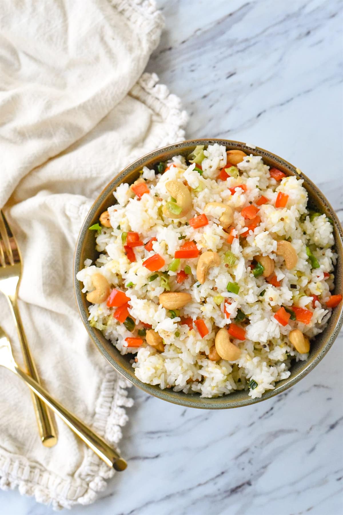 overhead shot of cashew nut rice in a bowl