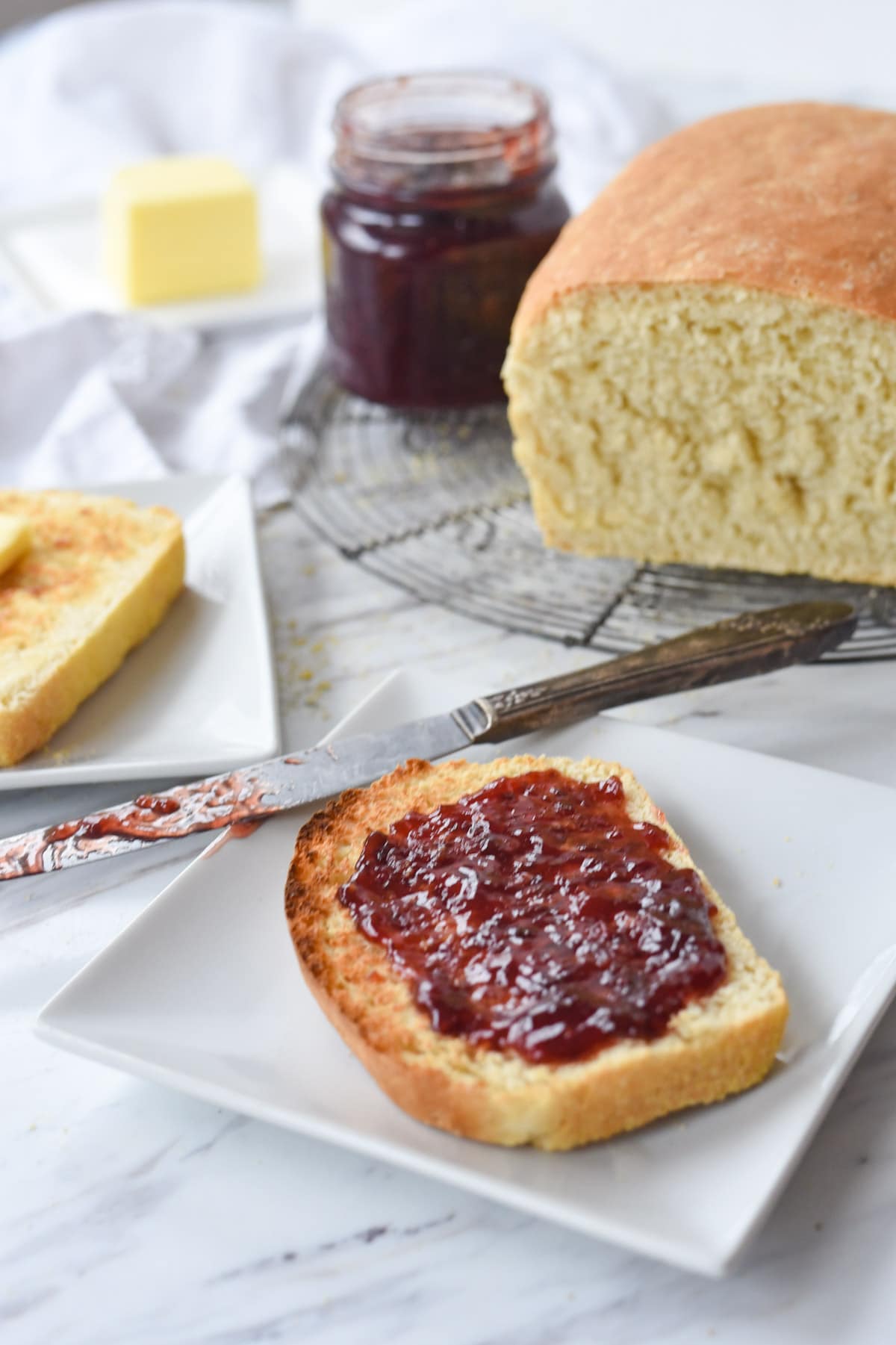 english muffin bread with jam on it