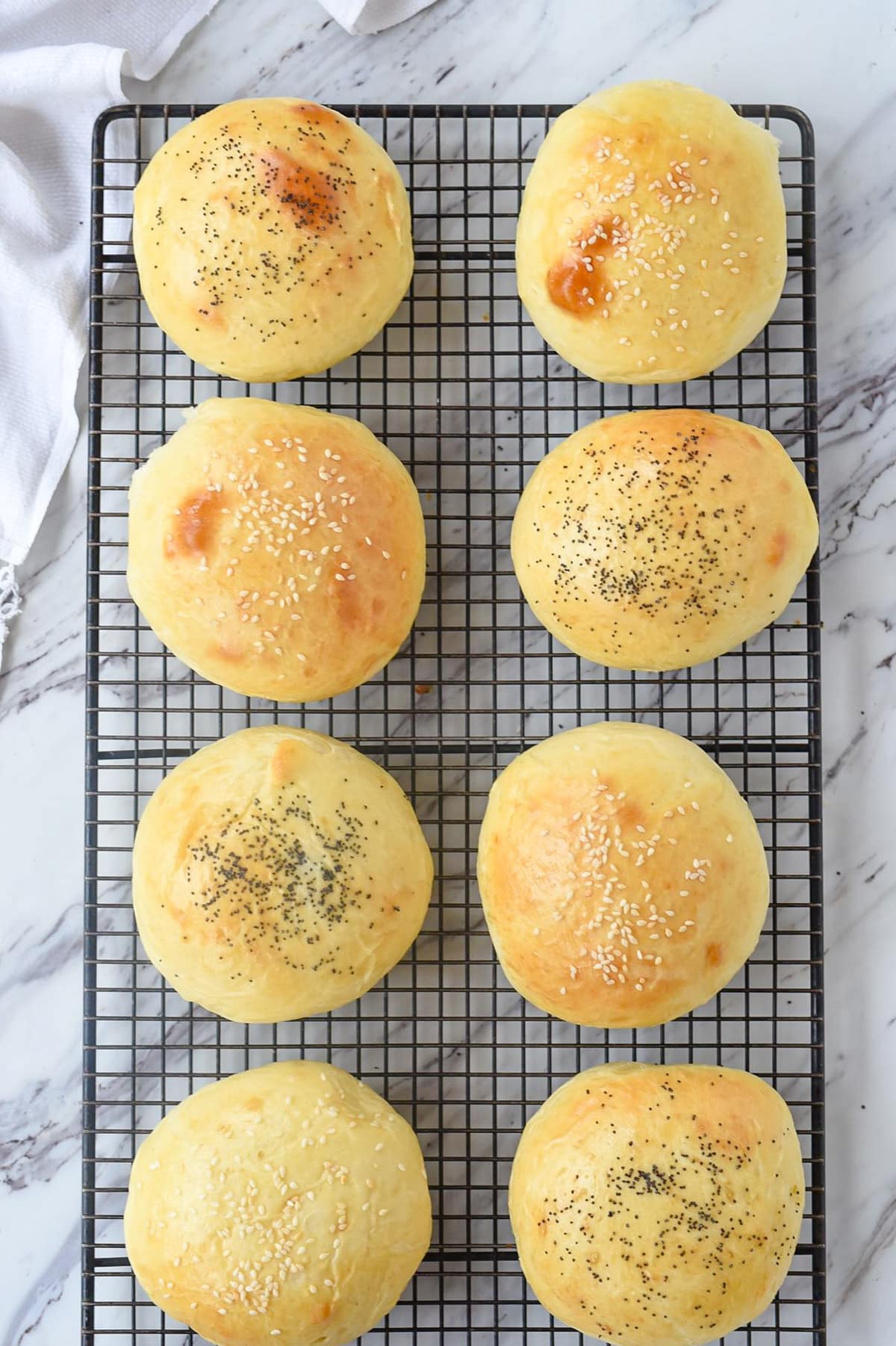 hamburger buns on a cooling rack