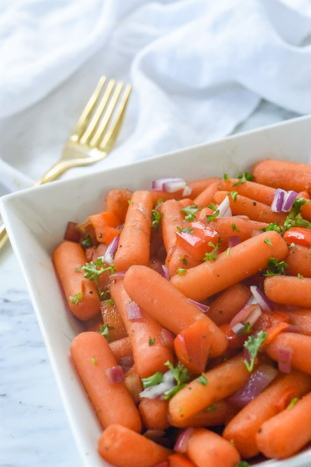 bowl of carrots and a fork