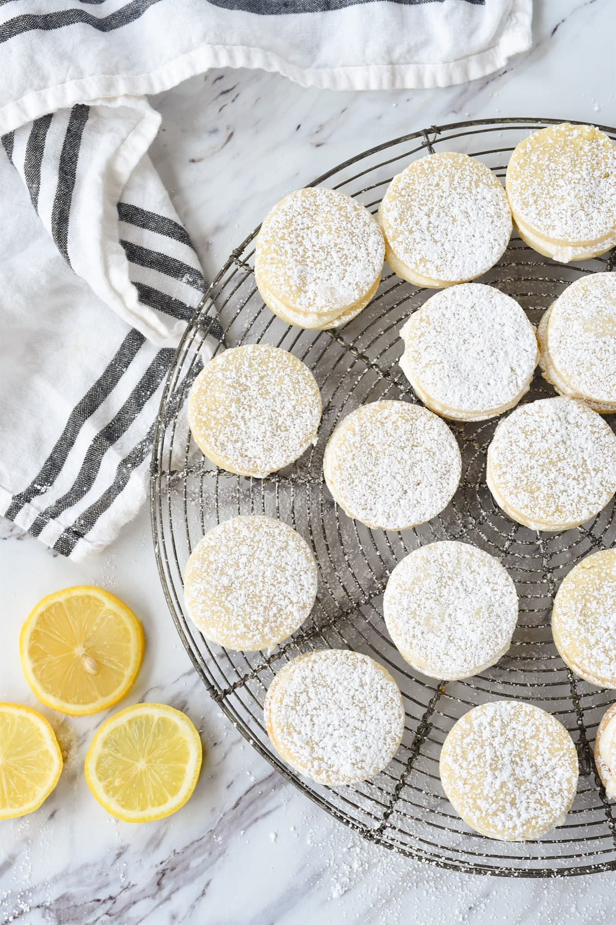 lemon dream cookies with powdered sugar on top