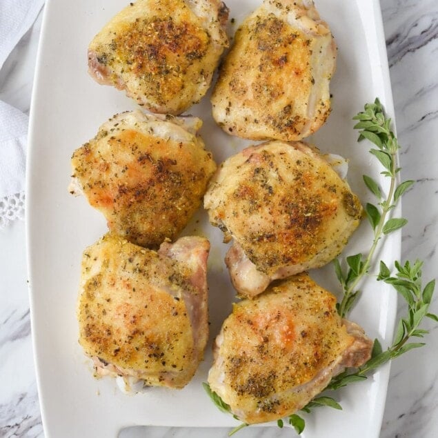 oregano chicken on a white platter