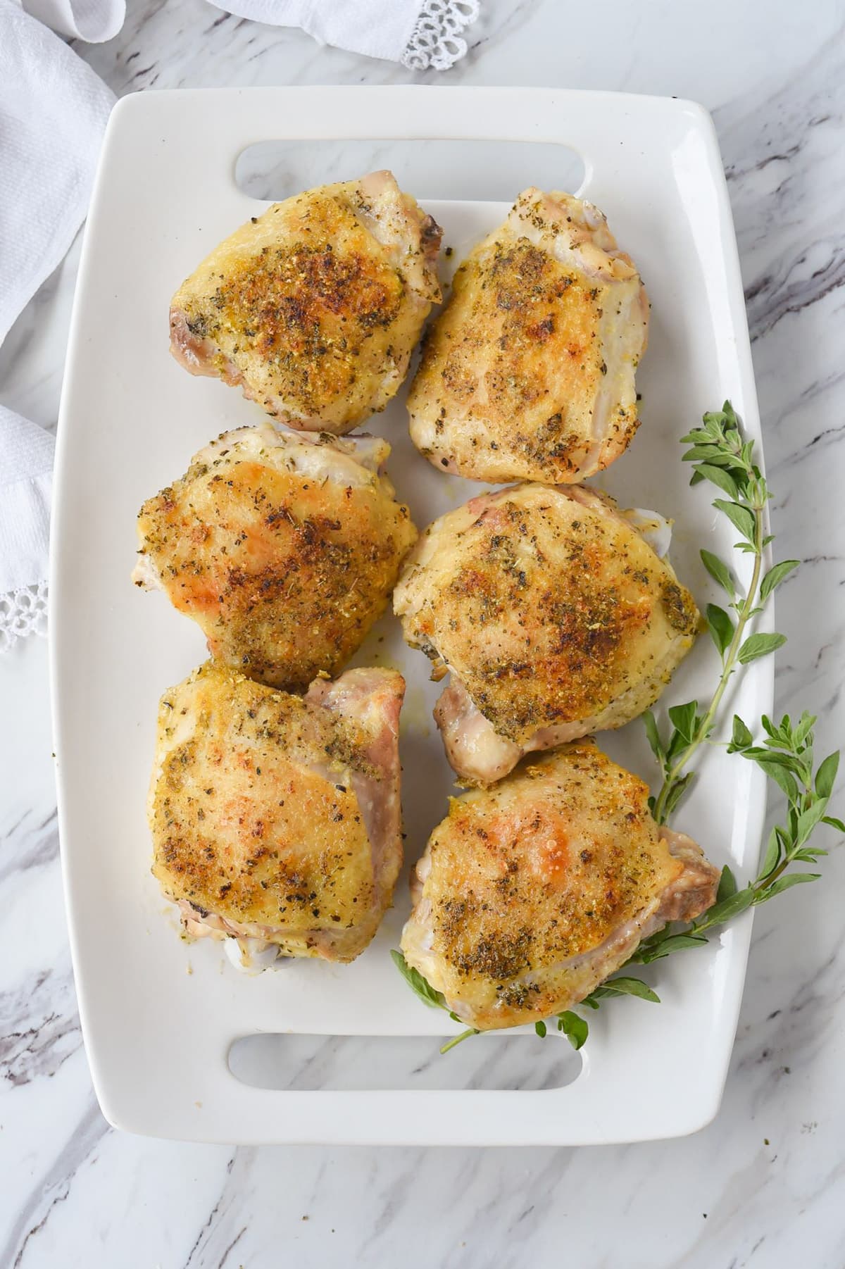 oregano chicken on a white platter