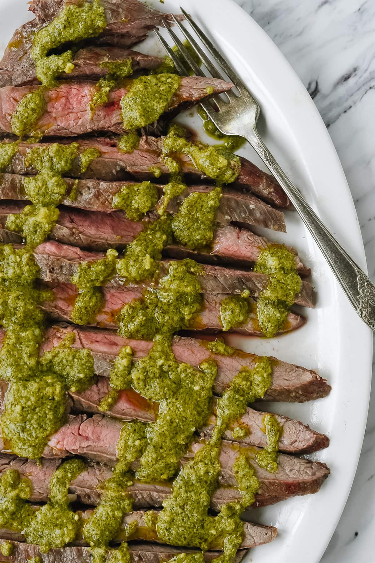 slices of pesto flank steak