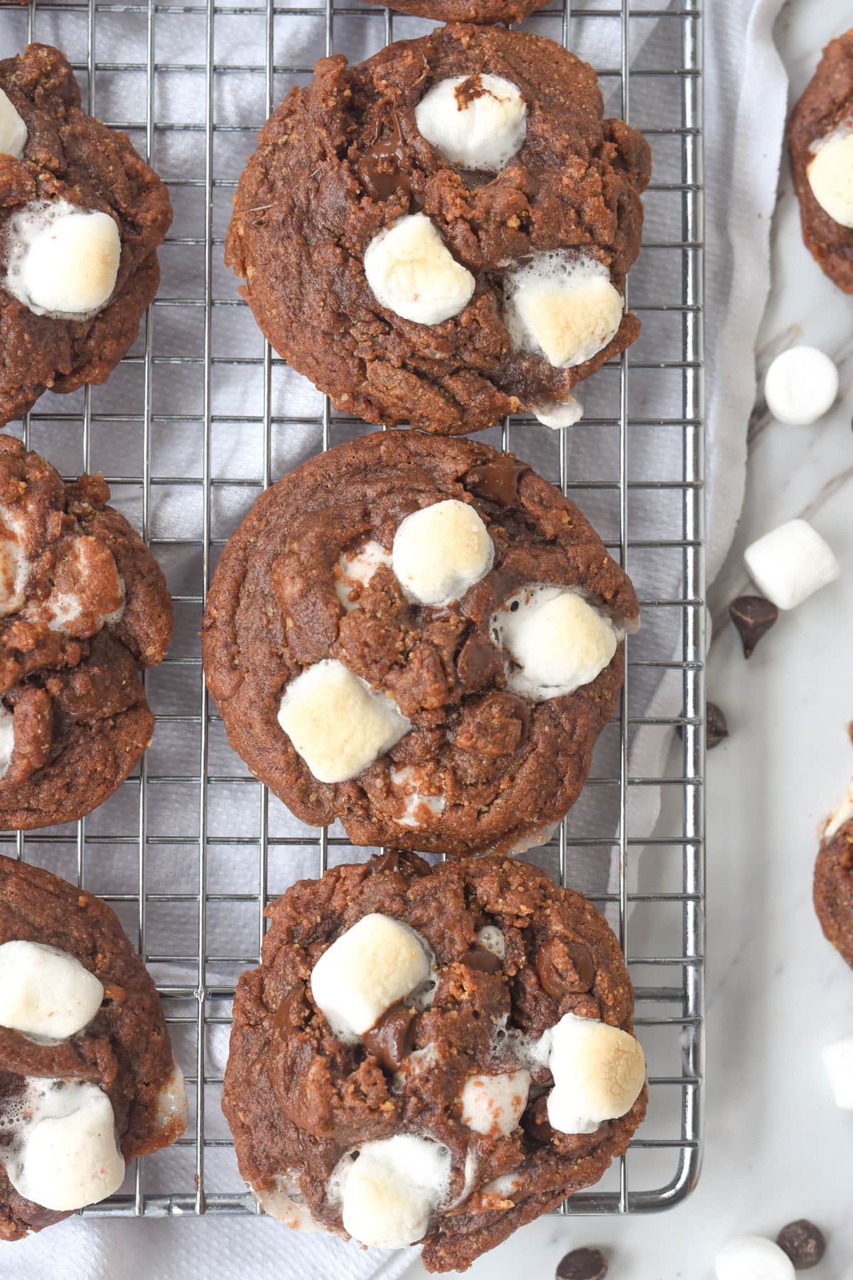 overhead shot of chocolate cookies with marshmallows