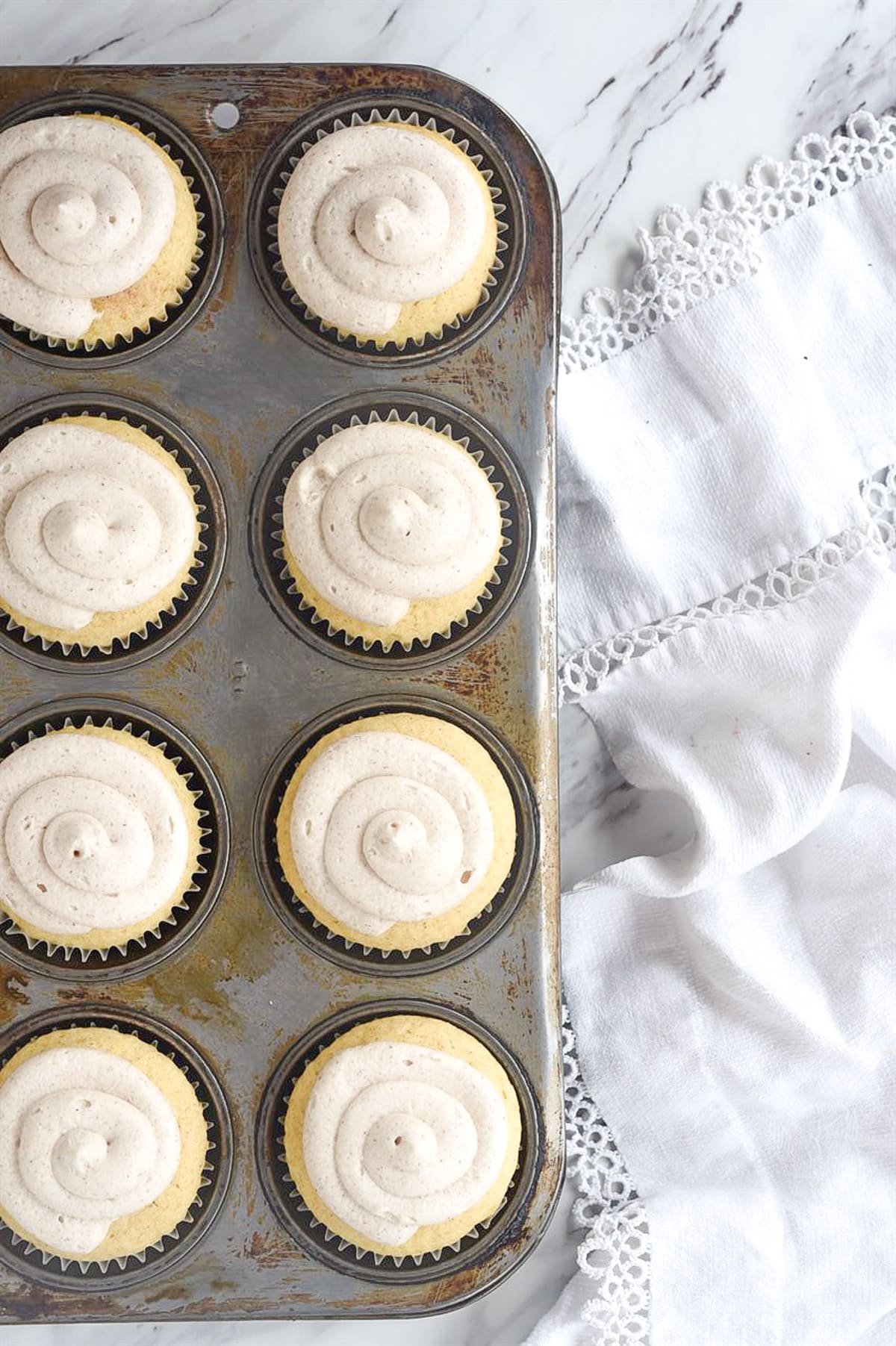 overhead shot of cupcakes in a muffin tin